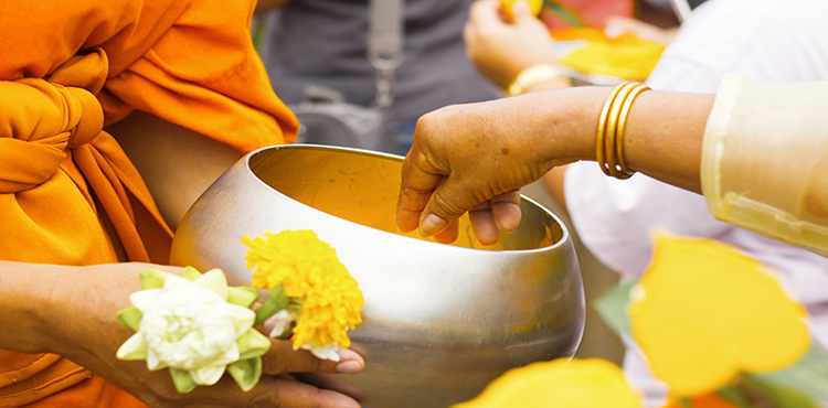 14657882372563_Laos_14641642462497_giving_alms.jpg